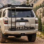 Mountain forest vinyl decal on a truck, side view