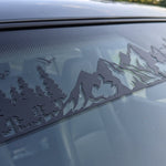 Mountain forest vinyl decal installed on a vehicle