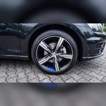 Blue reflective wheel rim stripe sticker on a car wheel