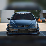 White and gold JDM racing windshield banner decal on a tuned coupe