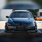 Black and red JDM racing windshield banner decal on a tuned coupe