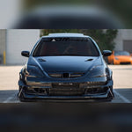 Black and gray JDM racing windshield banner decal on a tuned coupe