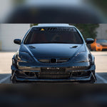 Black and gold JDM racing windshield banner decal on a tuned coupe