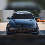 Glossy white JDM racing windshield banner decal on a tuned coupe