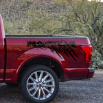 Glossy black claw scratch bed side decal on Ford F-150 Raptor