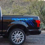 Glossy blue claw scratch bed side decal on Ford F-150 Raptor
