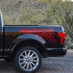 Glossy red claw scratch bed side decal on Ford F-150 Raptor
